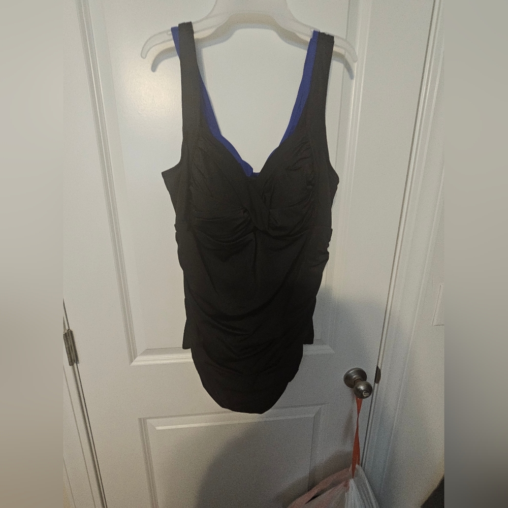 Black swimsuit Never worn. Size 2X 18W. Tummy control